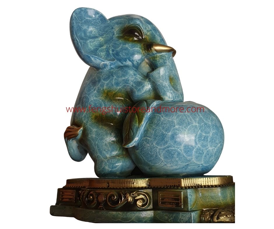 Elephant-lowered-trunk-with-peach-light-blue-colour-resin-Material